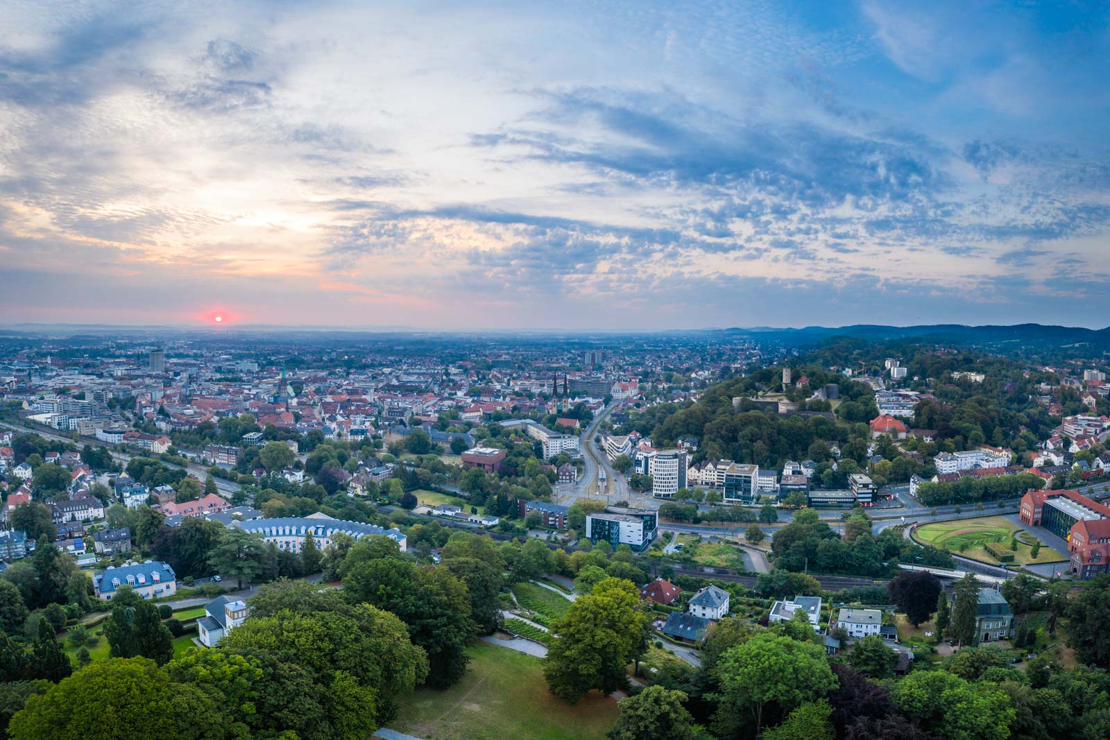 Sunrise over the city centre in August 2020 (Bielefeld, Germany).