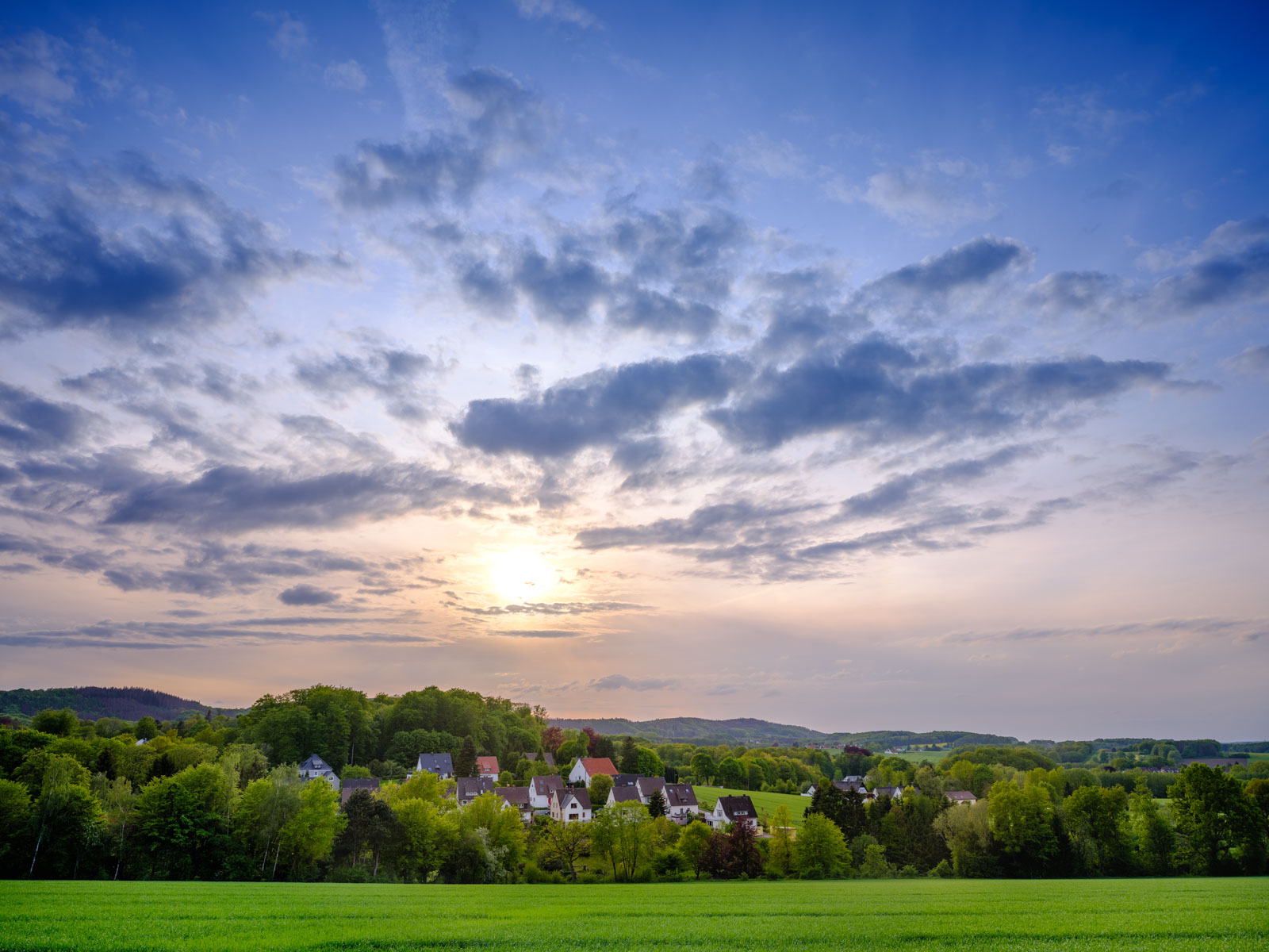 A sunset in May over the fields in Hoberge-Uerentrup (Bielefeld, Germany).