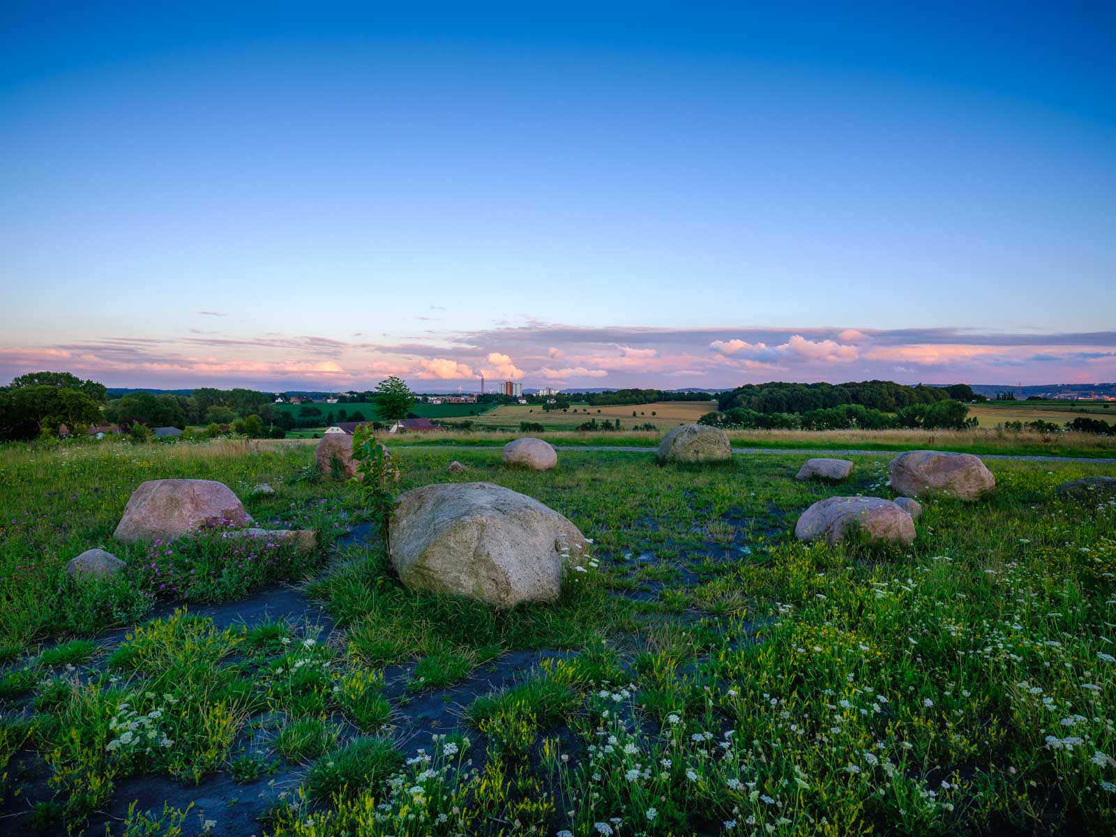 Landscape with erratic rocks at 'Johannisbach' in July 2020 (Bielefeld, Germany).
