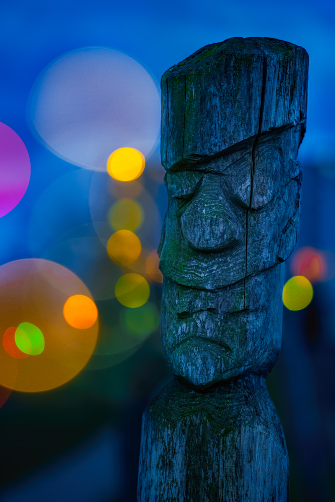 Wooden idol at dusk in Bielefeld-Baumheide (Germany).