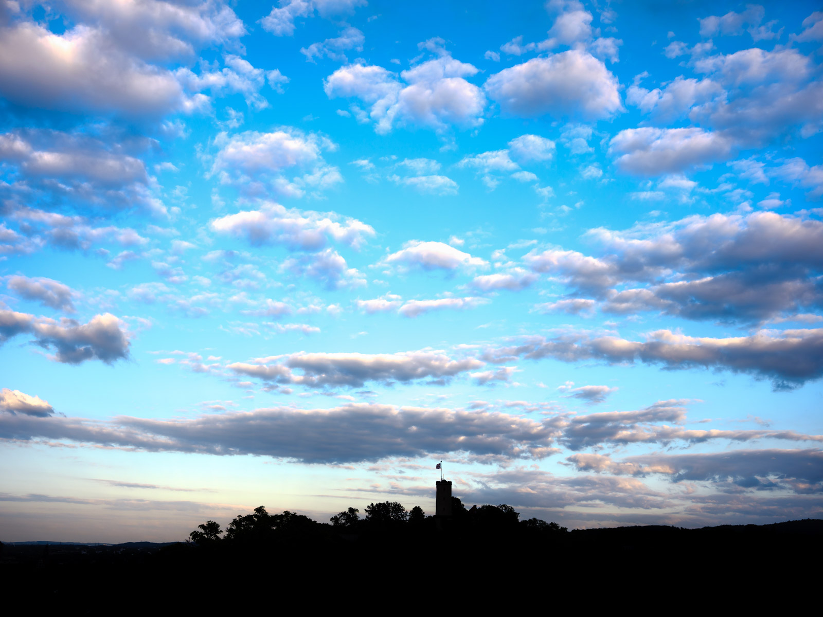 Silhouette with clouds at 'Sparrenburg' castle (Bielefeld, Germany).