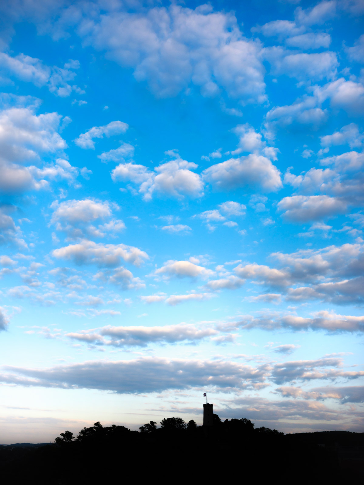 Silhouette with clouds at 'Sparrenburg' castle (Bielefeld, Germany).