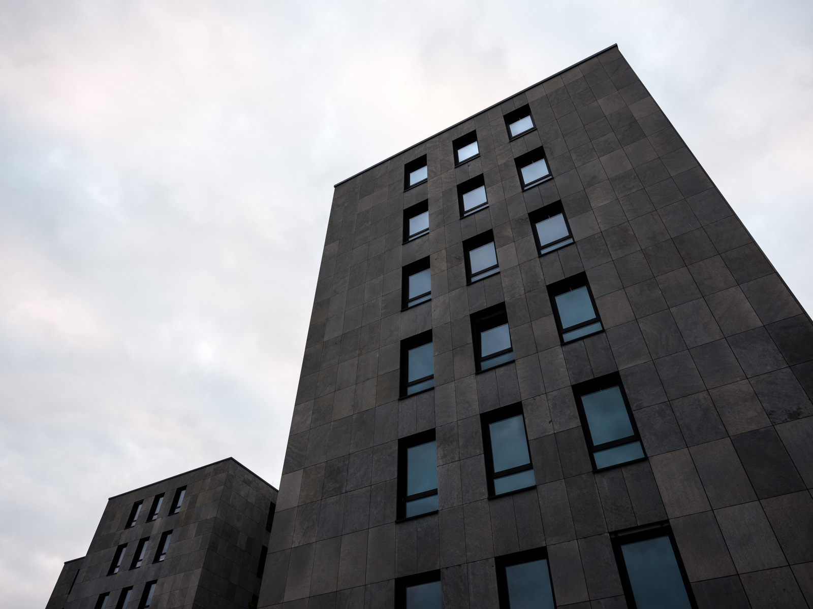 Dark facade. Office building located at  'Herforder Straße 73' in July 2020 (Bielefeld, Germany).