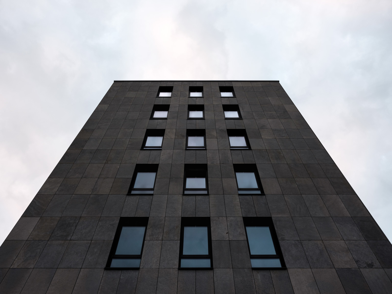 Dark facade. Office building located at  'Herforder Straße 73' in July 2020 (Bielefeld, Germany).
