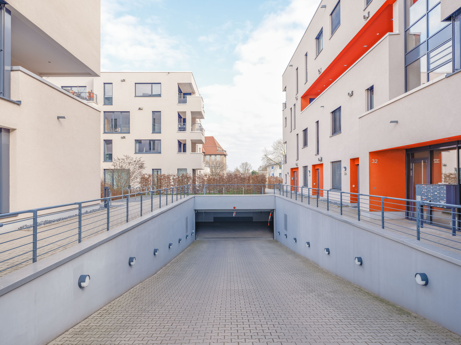 New housing estate with garage entrance on 'Walther-Rathenau-Straße' in March 2021 (Bielefeld, Germany).