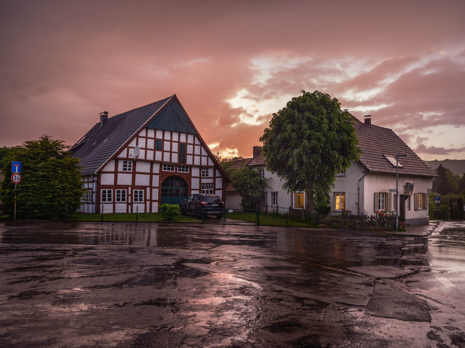 Rain clouds at dusk over Kirchdornberg in May 2021 (Bielefeld, Germany).